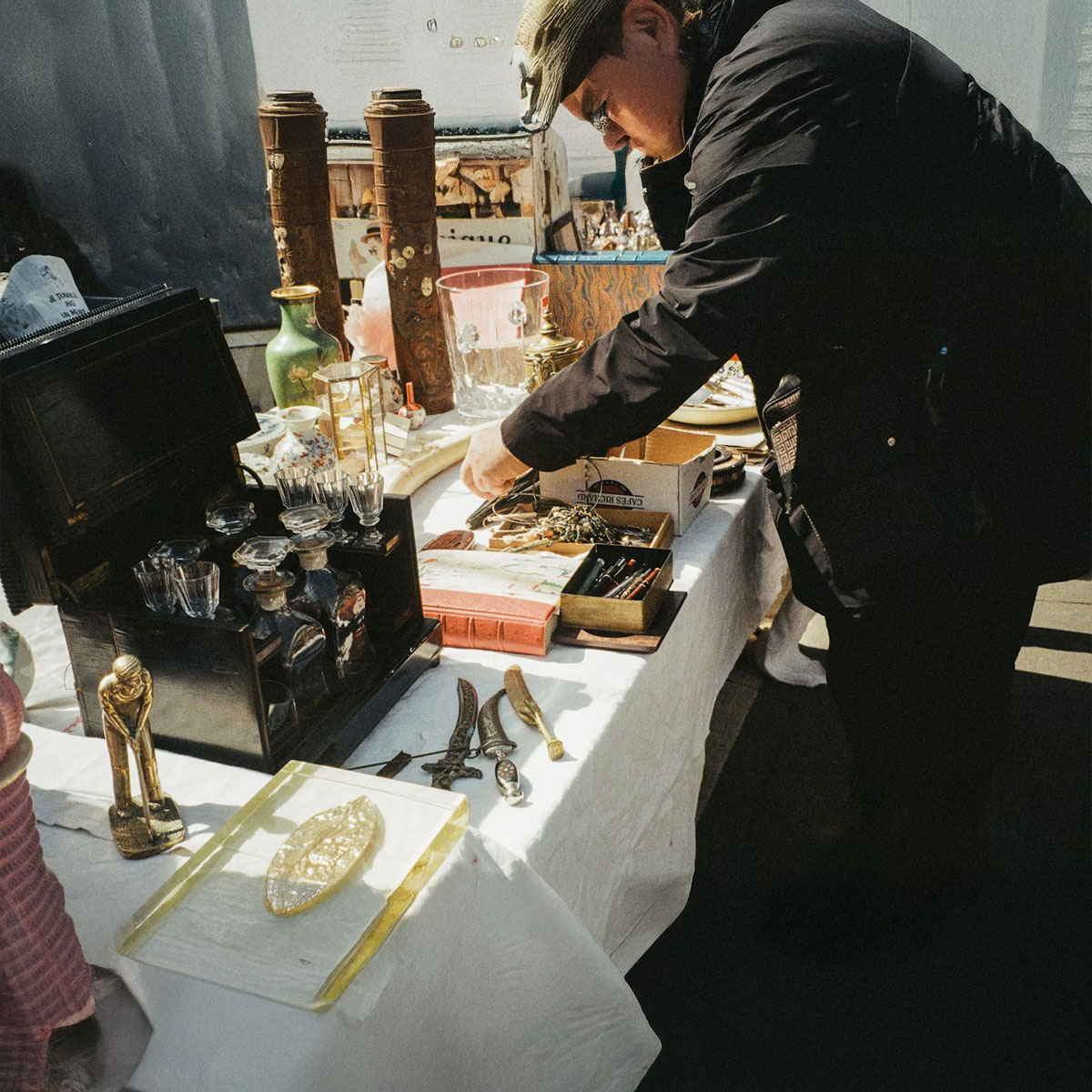 a person watching antiques