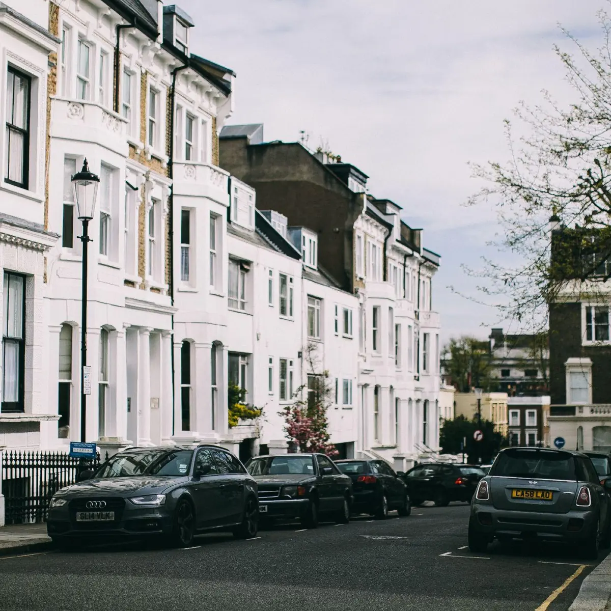 White stucco terraced houses in Belgravia, one of the best areas for flats in London near Mayfair