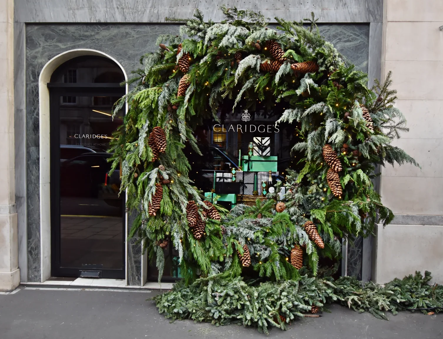 Claridge's entrance on Brook Street framed by a giant Christmas wreath